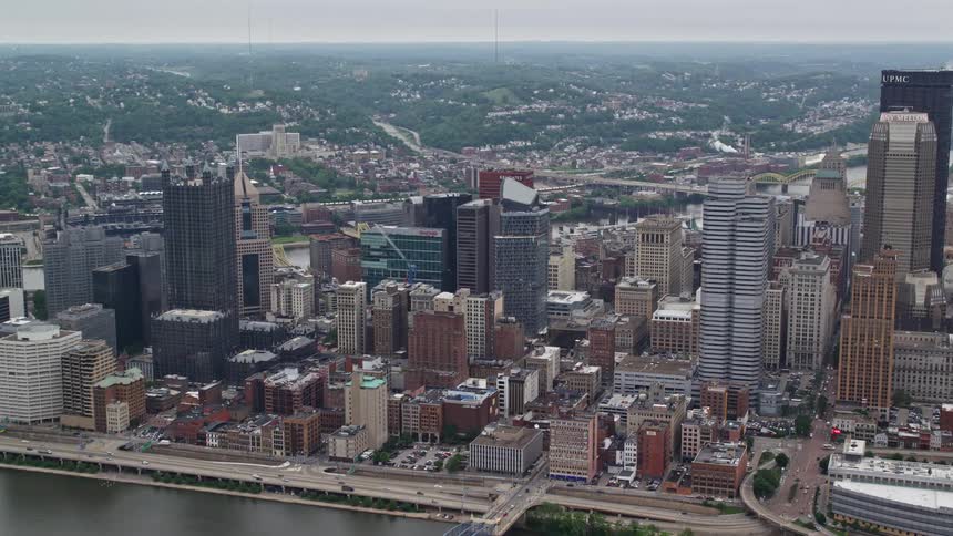 Aerial view of a cityscape under an overcast sky