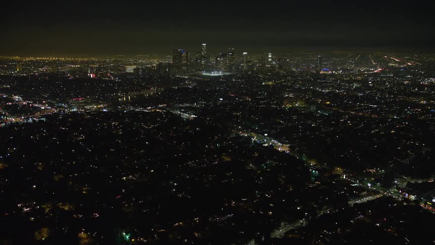 Aerial panorama of a big city with skyscrapers at night