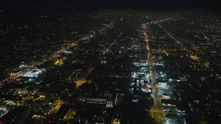 The city is brightly lit at night