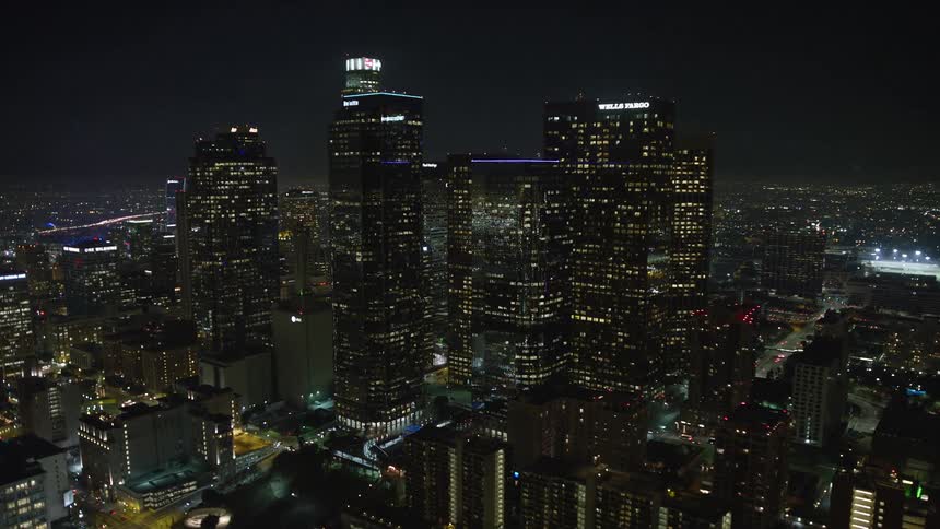 Traffic runs through the city at night