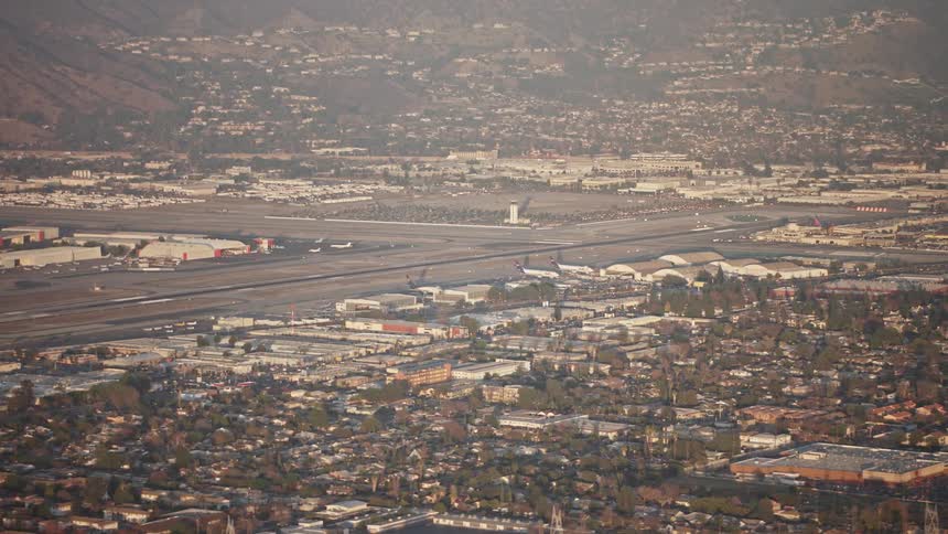 An airport sits in the middle of a city