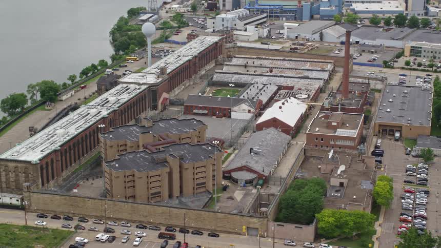 Orbiting aerial view of western state penitentiary in pittsburgh