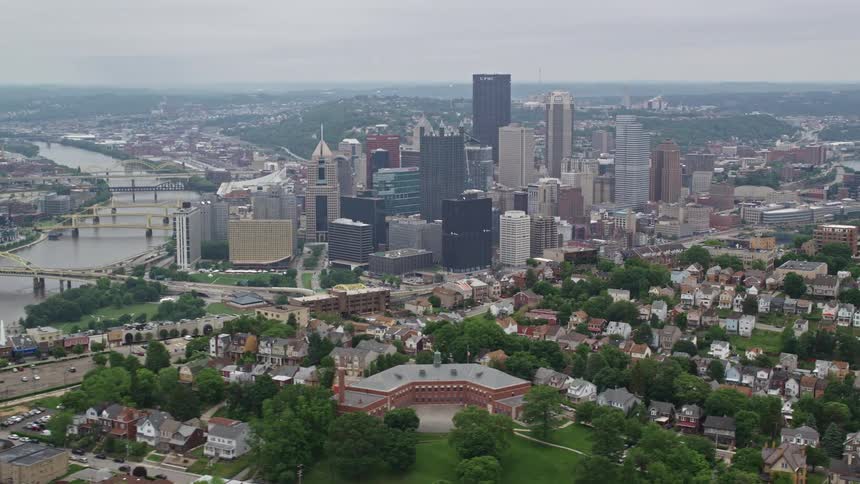 An aerial clip of a city filled with vegetation