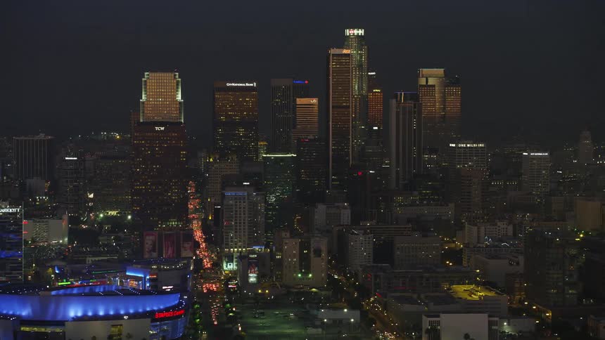 Aerial panorama of a metropolis like modern skyscrapers illuminated at night