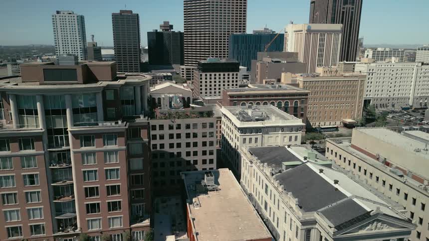 An aerial clip of a city filled with high buildings