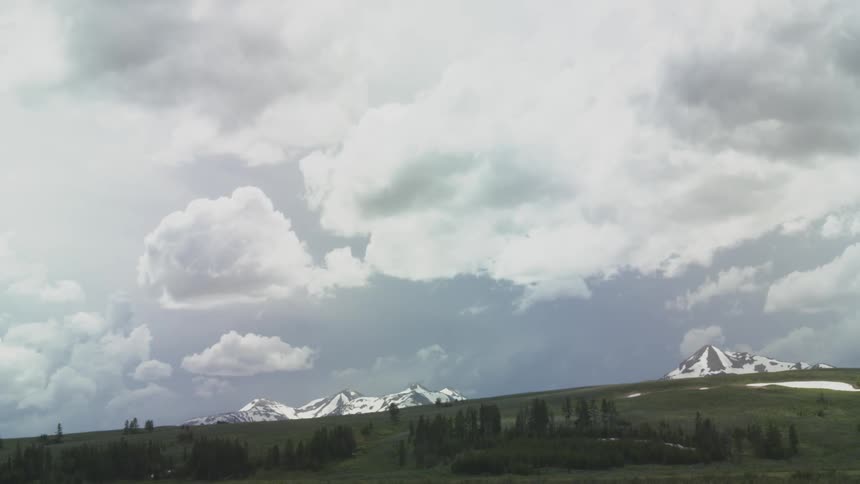 Looking up from a mountain valley to the sky