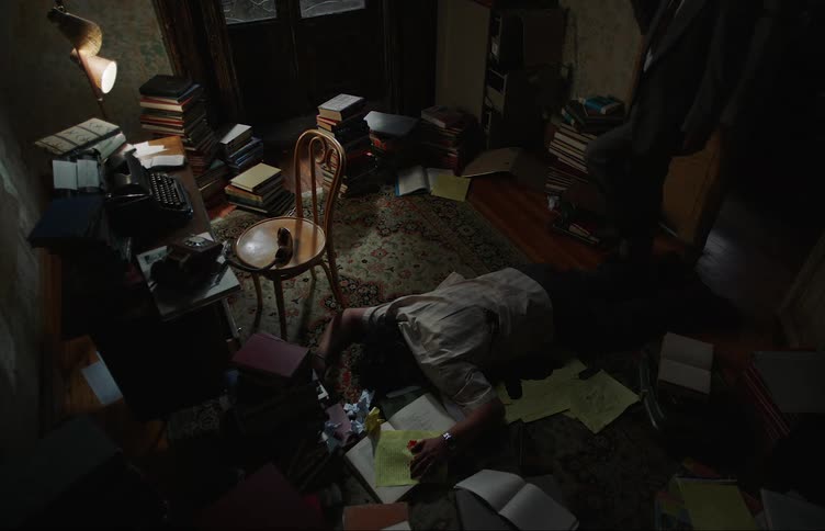 Two detectives discover a body in a room