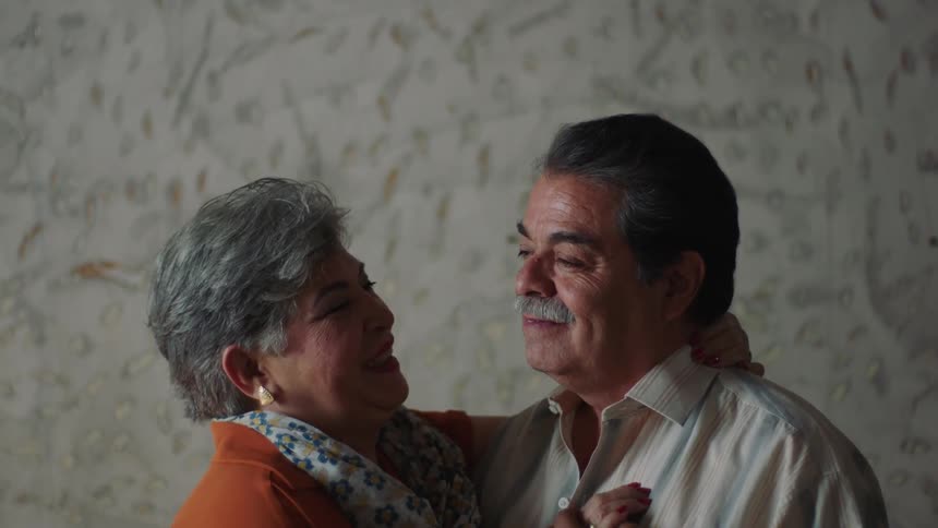 A man and woman are dancing