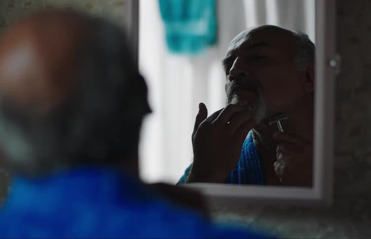 Room begins to shake as man shaves in the bathroom and he rushes out