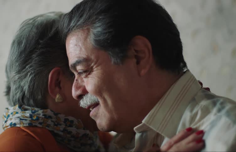 Close up of an elderly couple having fun dancing