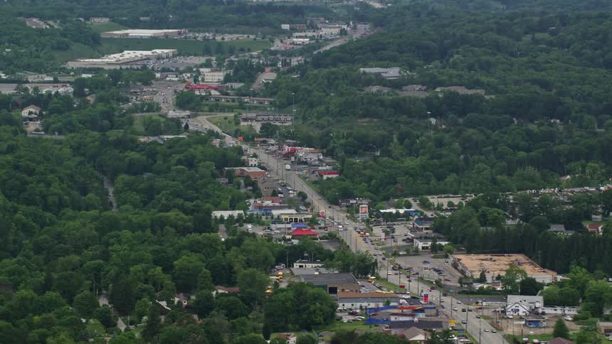 A long road running through a surburban area