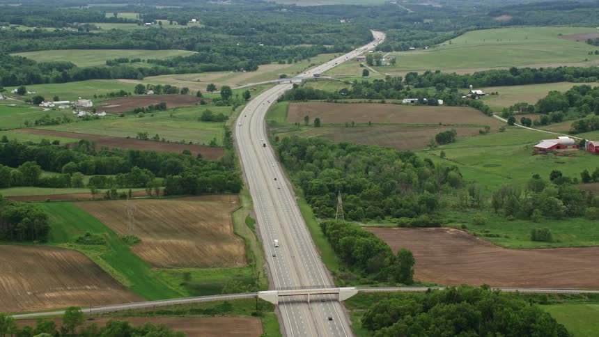 Vehicles travel on the highway