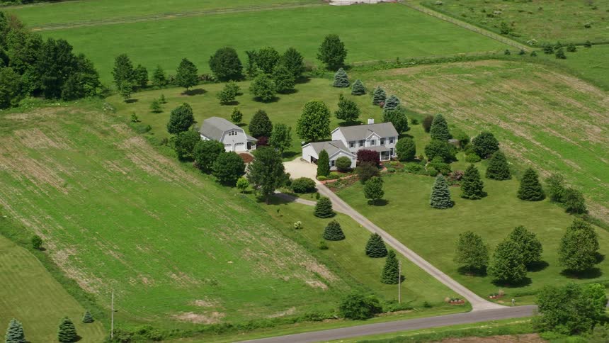 Aerial panorama of a roadside residence in a rural area