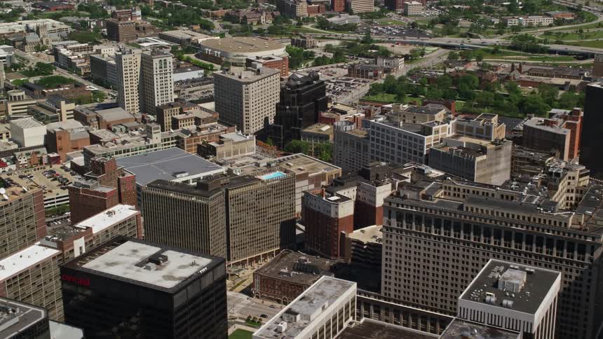 An aerial clip of a city and apartment buildings