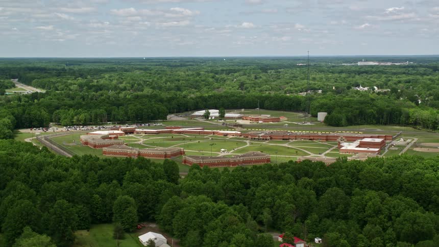 A campus is in the middle of the woods