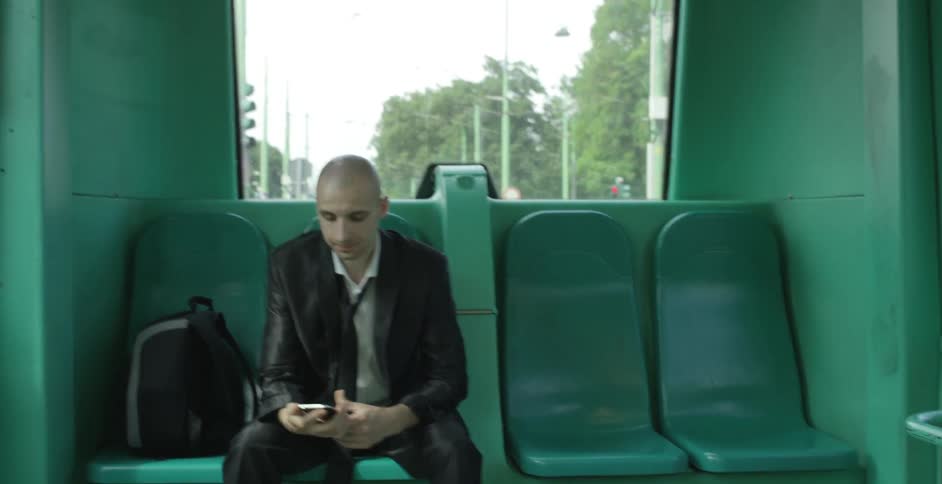 A person sitting on a bus