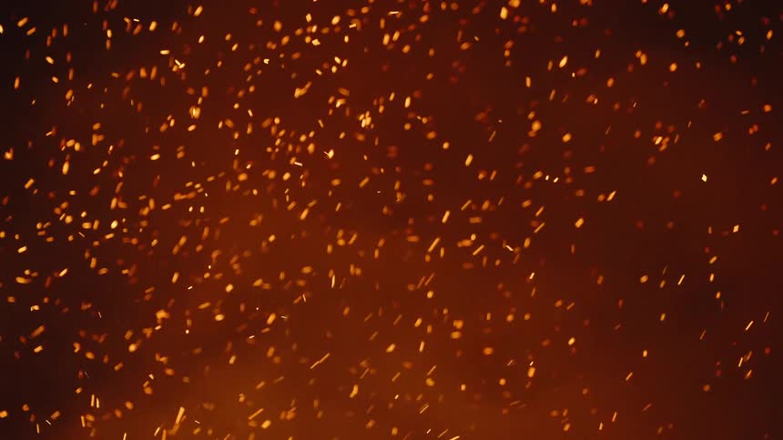 A fire is burning at night