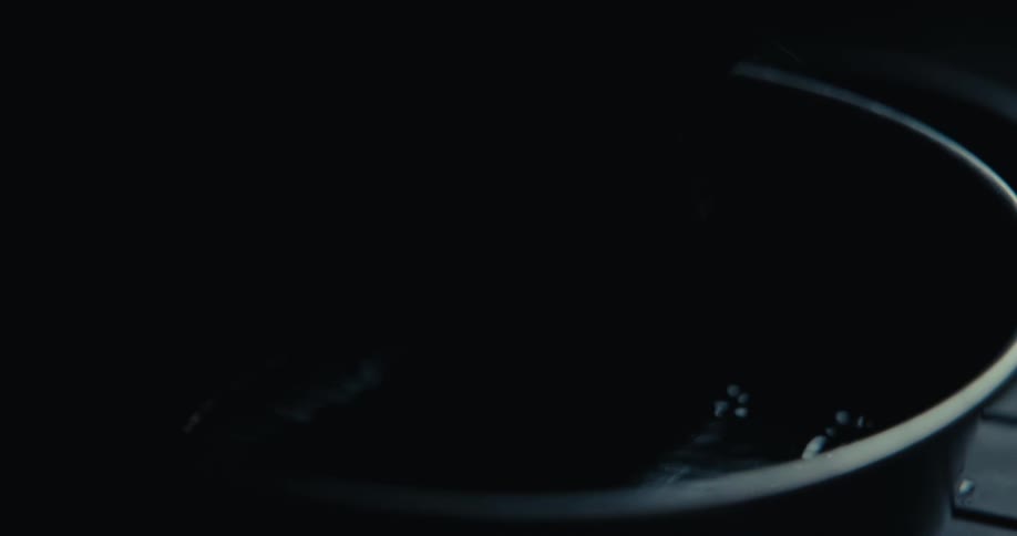 Water pouring into a pan