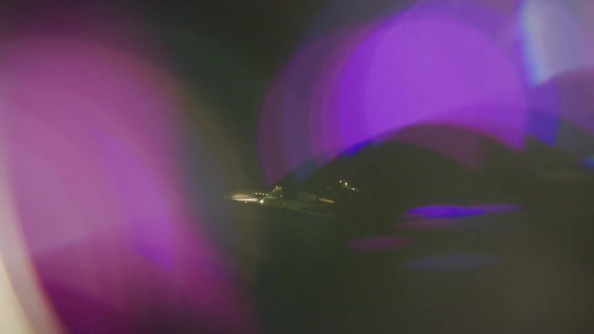A plane takes off at night