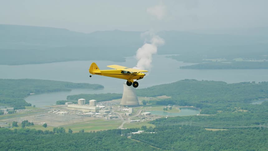 A plane flies near a nuclear power plant