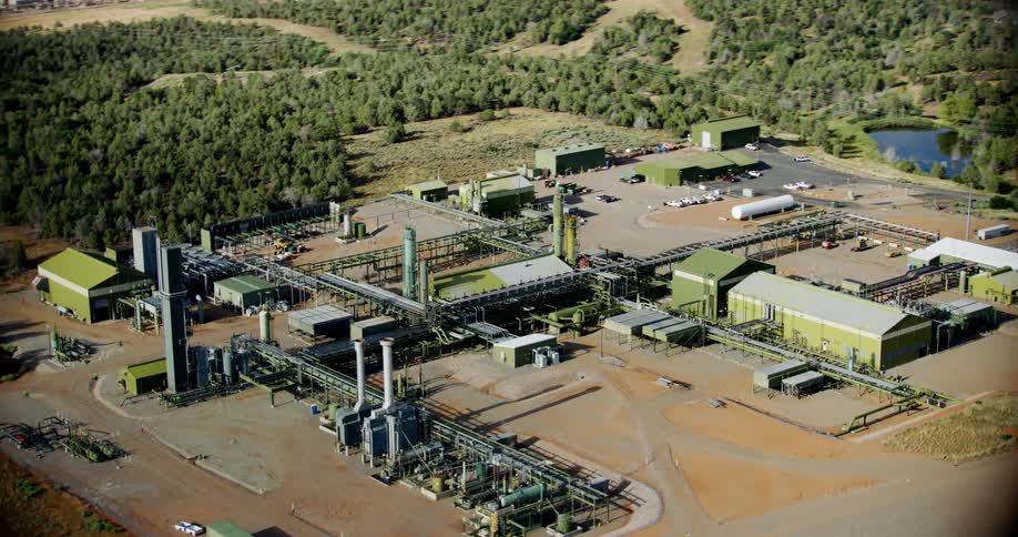 An aerial view of an industrial plant in a rural area
