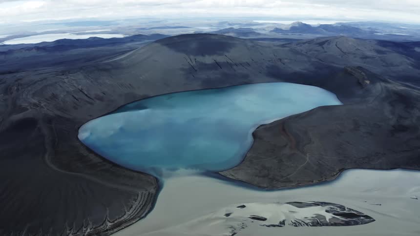 Blue lake in an glacial crater