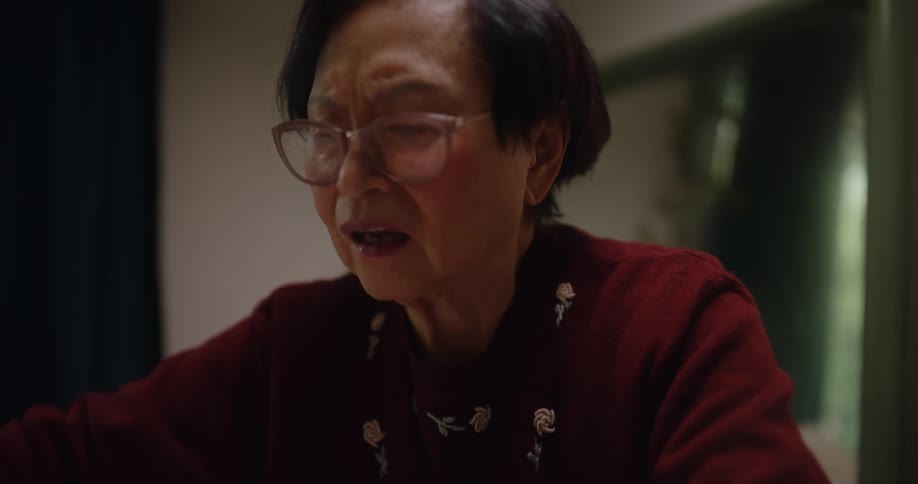A clip of an asian woman arranging some capsules