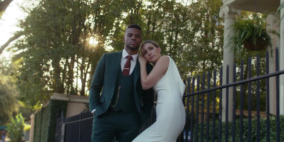 Man and woman holding each other outdoors