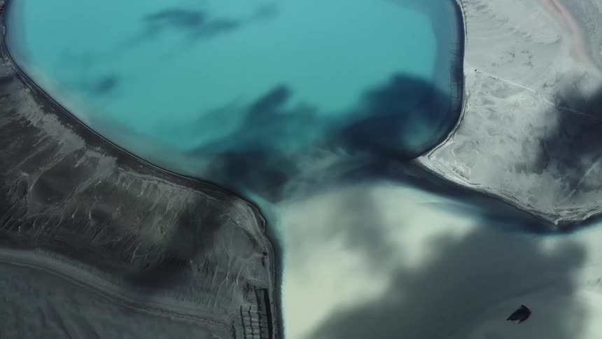 An aerial clip of a pond in the arctic