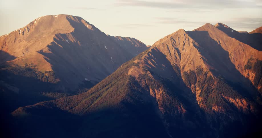 Rocky mountain range with vegetation in a morning