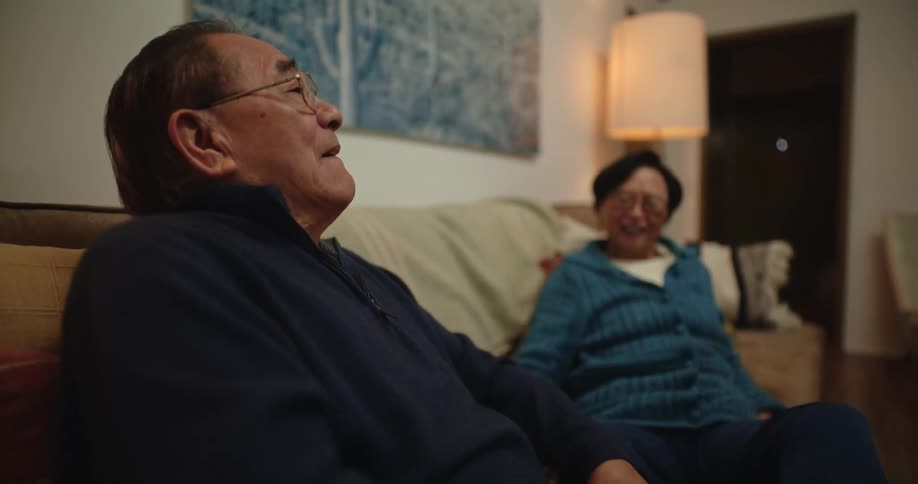 A man massages his wifes legs