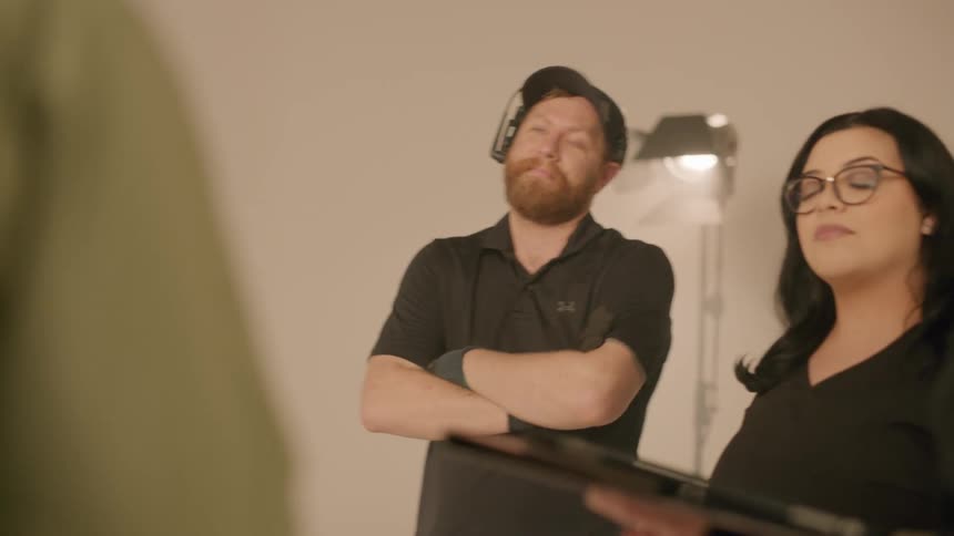 A production crew listening to the director