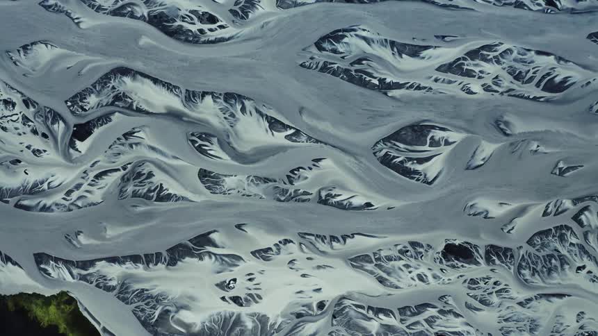 Snow covered arctic land formation with valleys