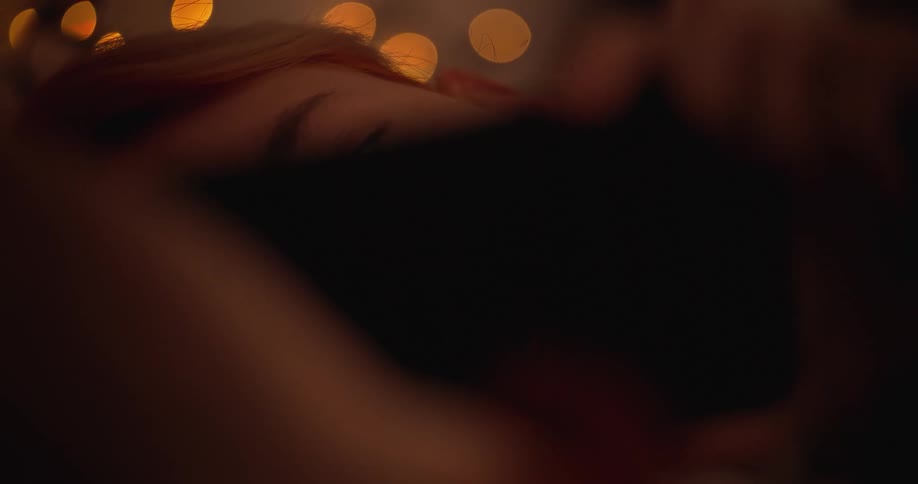 Woman in bed answering a phone call