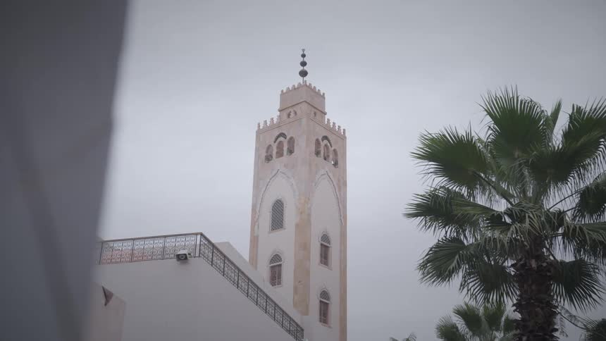 Tower of the hassan ii mosque at dawn