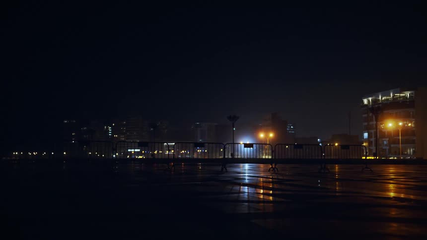 Exterior view of illuminated buildings at night in a city