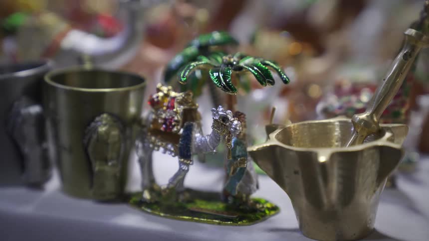 Close up of metallic decorative objects on a store shelf