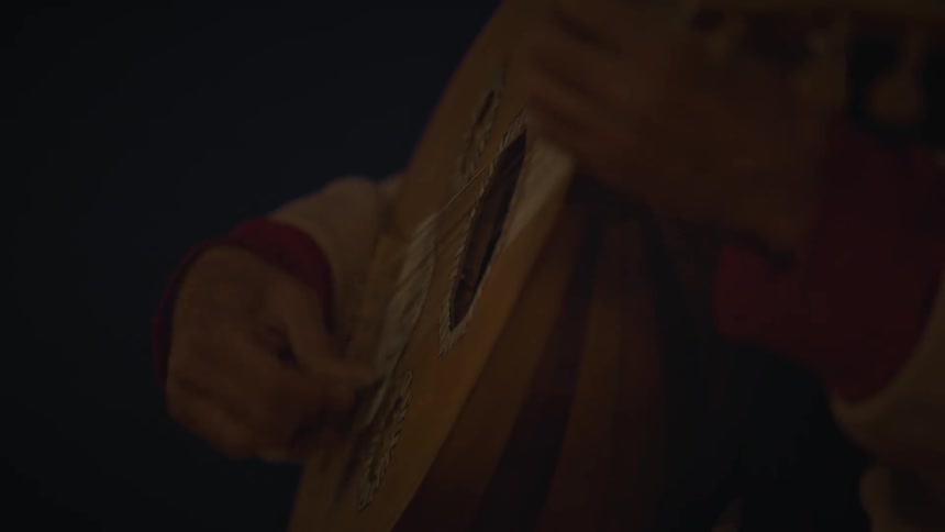 Hands of a man playing a mexican violin