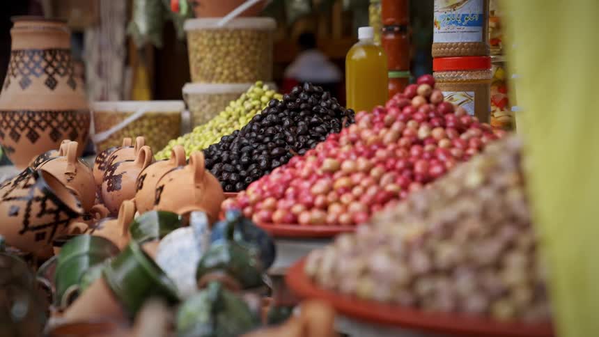 A clip of berries sauces and grains in the market