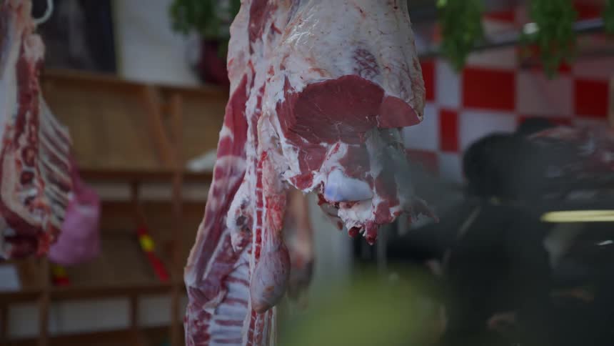 Meat hangs in a food shop