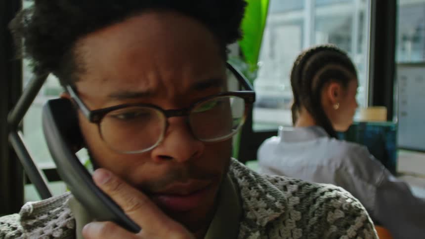 Portrait of a man talking on the phone