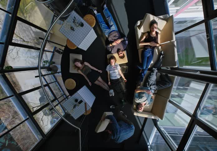 A group of people sleeping in a room
