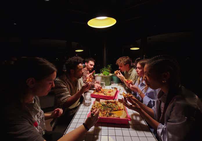 A group of friends having dinner together