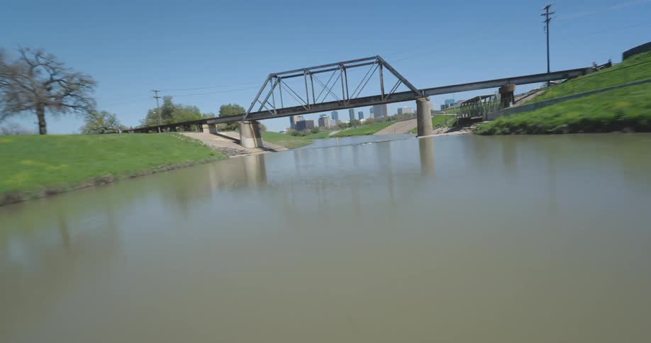A clip of a river in a neighborhood