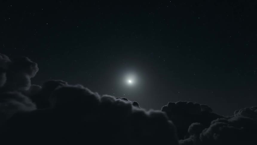 The moon shines as dark clouds loom