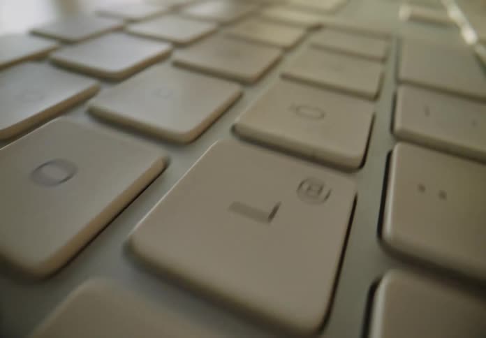 Moving over they keys on the keyboard of a laptop computer