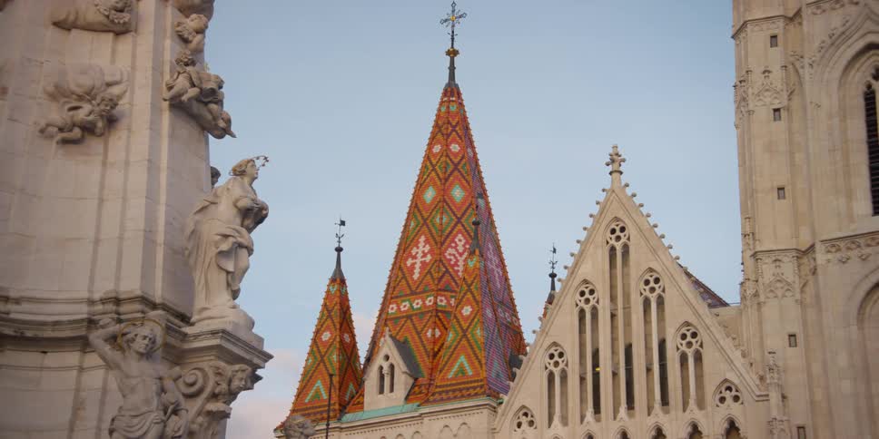 Matthias Church with Holy Trinity Statue in Holy Trinity Square of Budapest
