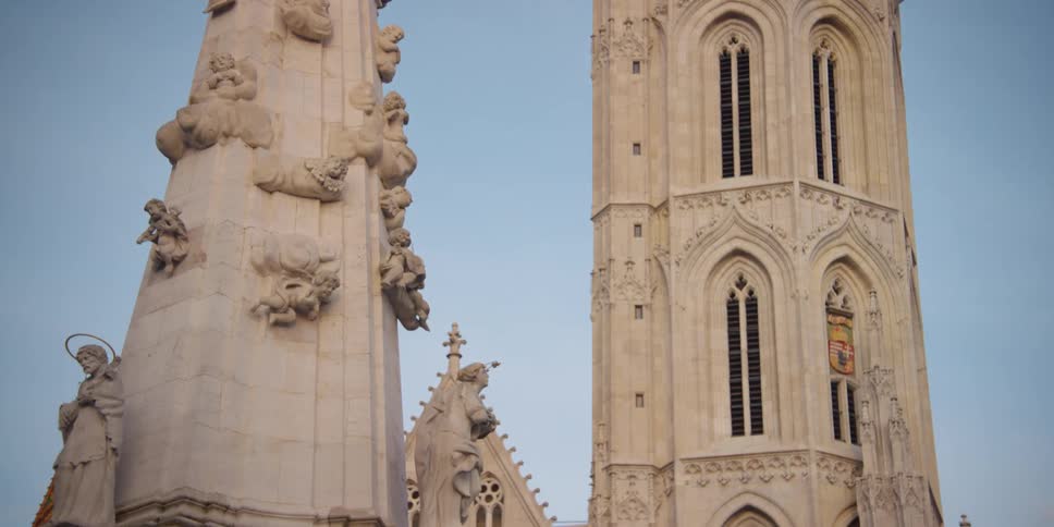 Holy Trinity Statue in front of Matthias Church in Budapest on a cloudless blue sky day