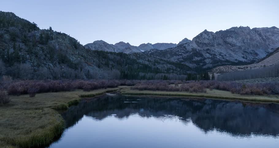 The mountains reflect on the lake