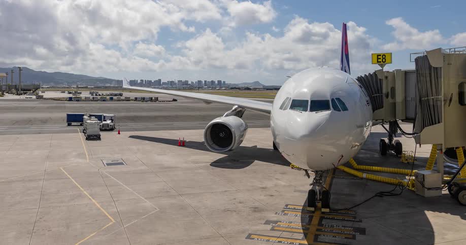 Time lapse of a commercial airplane while its boarding